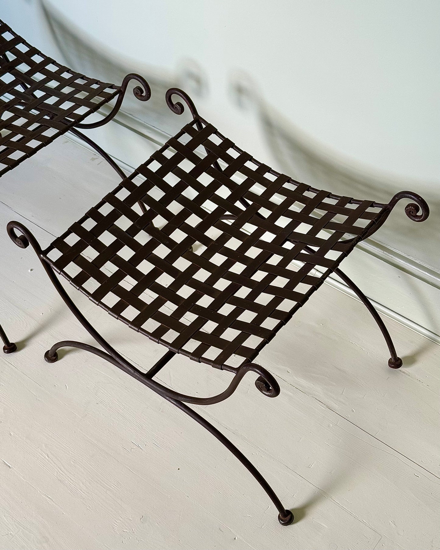 Pair of Wrought Iron Curule Stools with Sculptural Curls