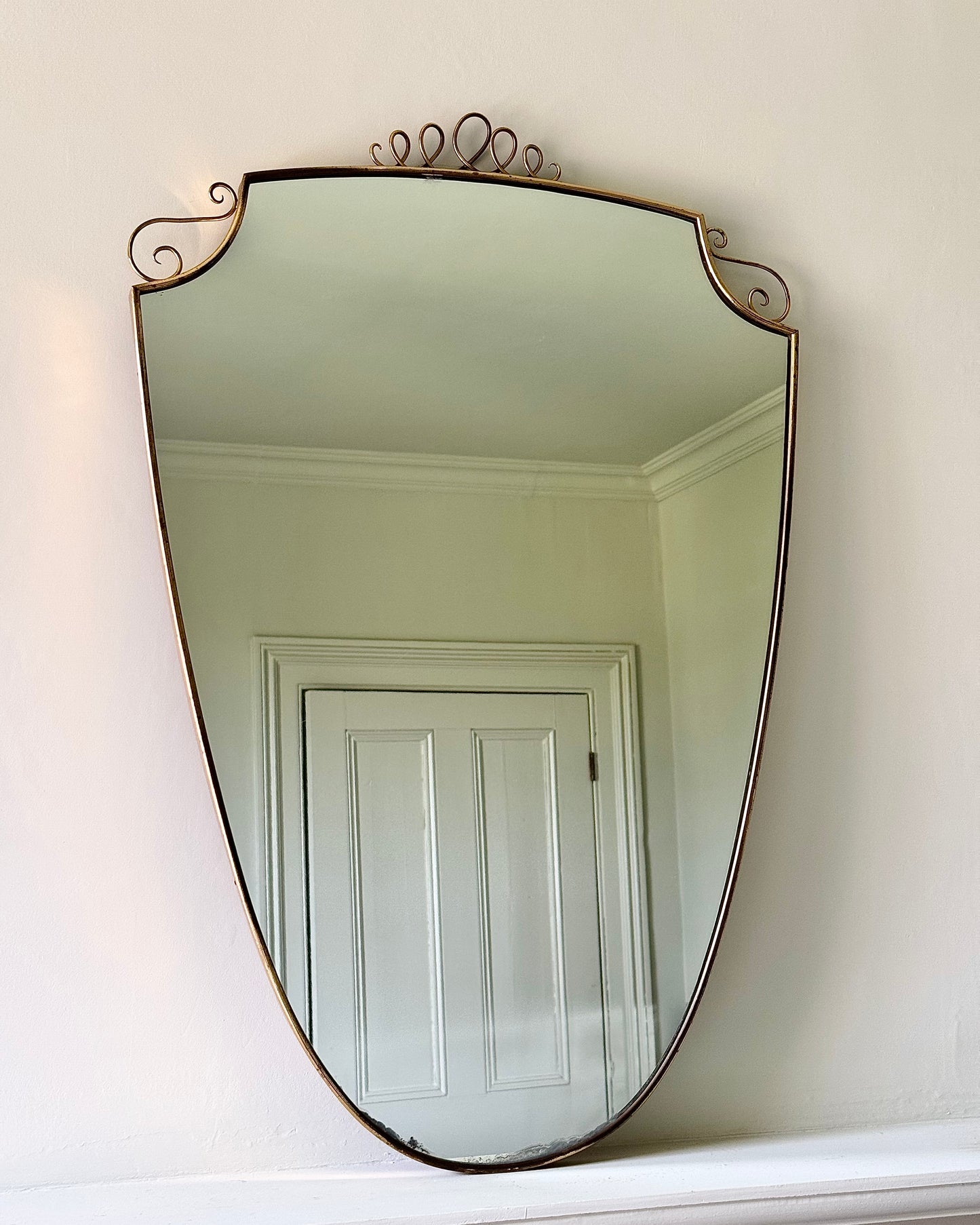 Large Italian Mid-century Brass Shield Mirror