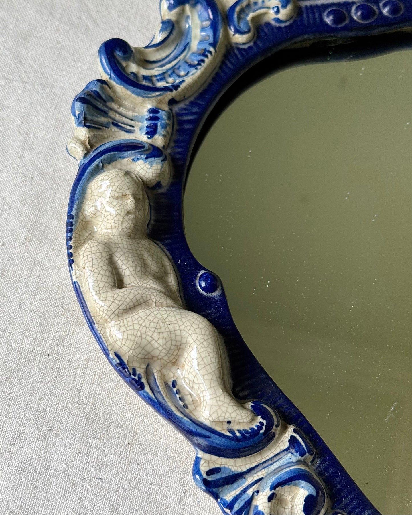 Italian Ceramic Mirror with Cherubs and Shell Motif