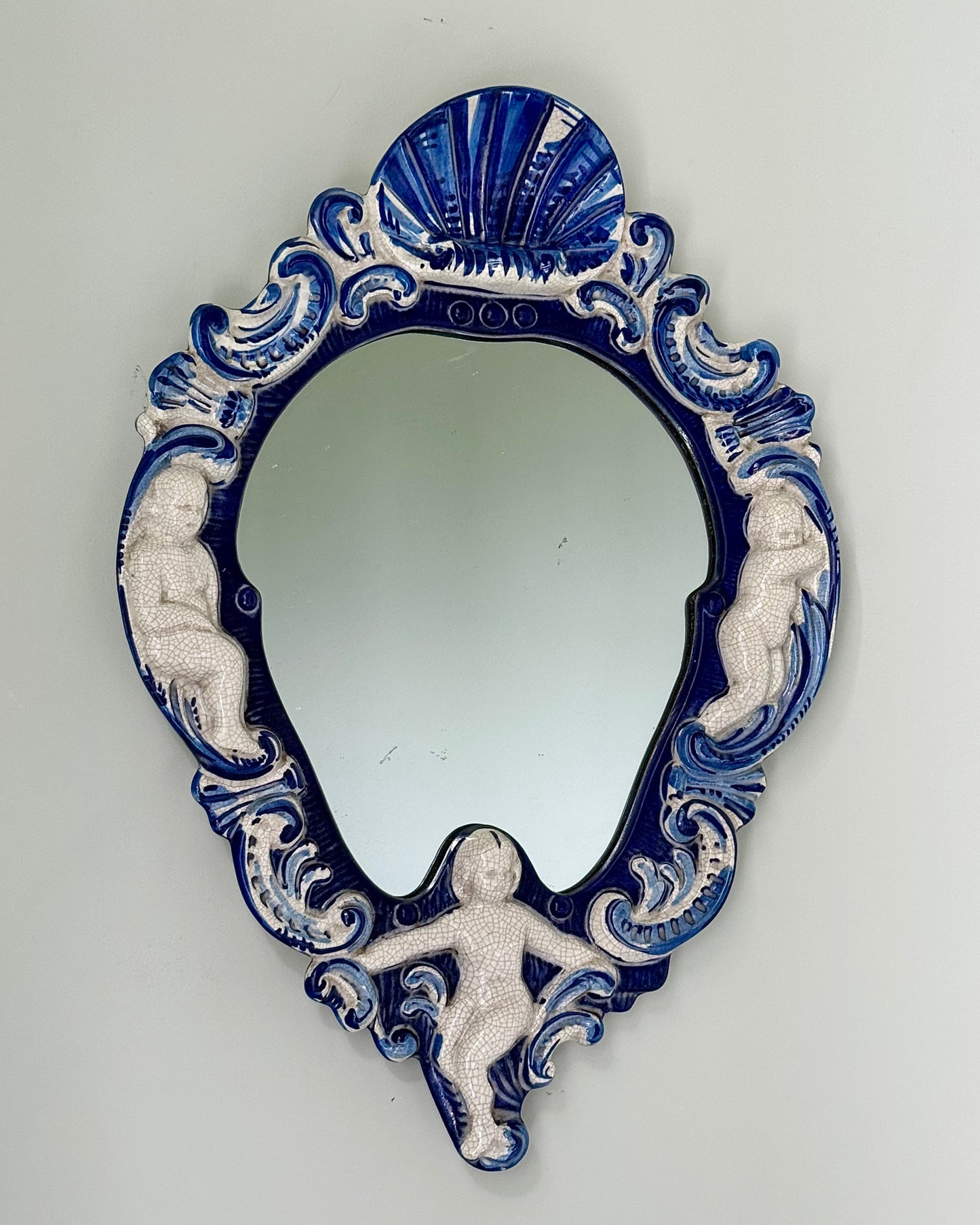 Italian Ceramic Mirror with Cherubs and Shell Motif