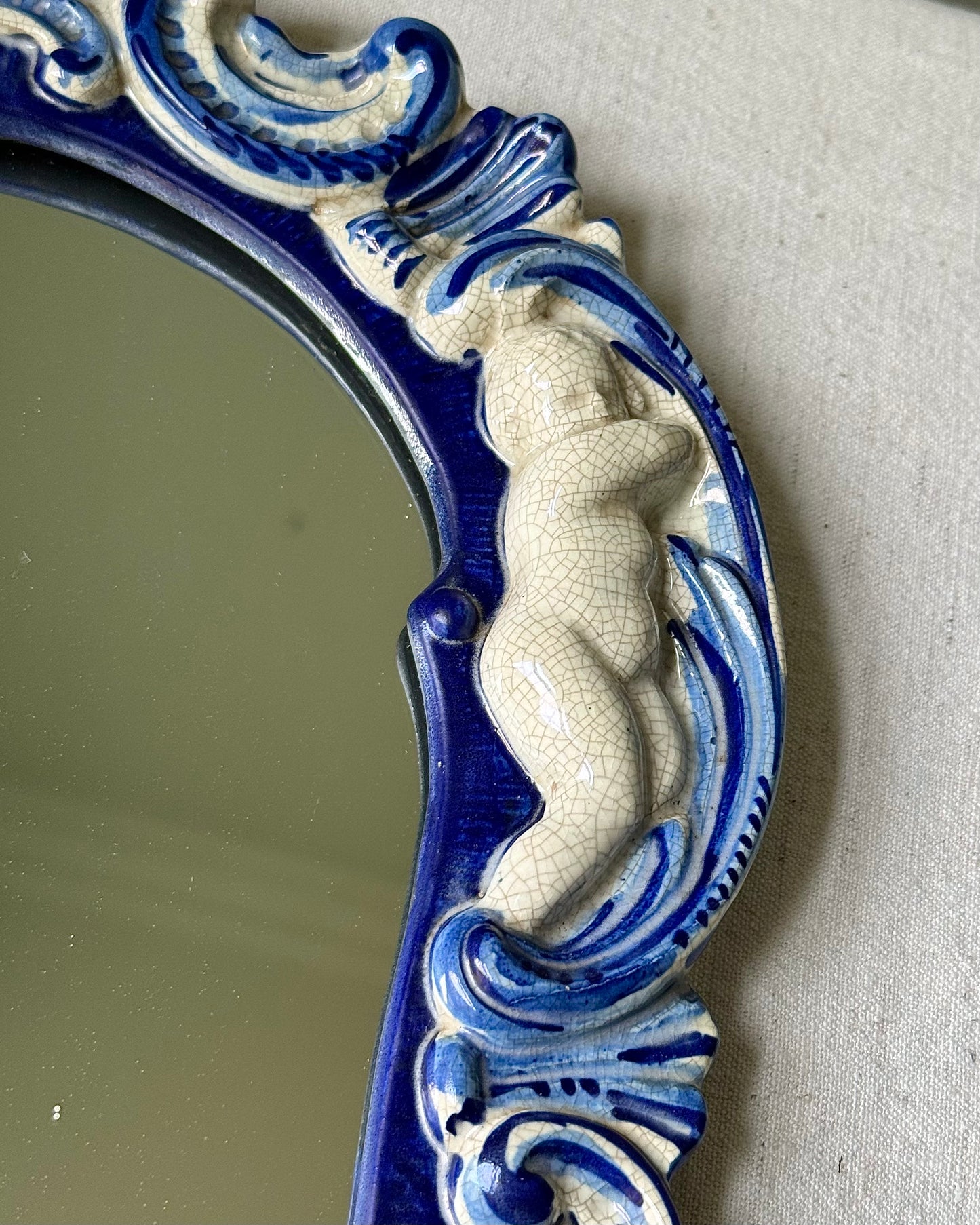 Italian Ceramic Mirror with Cherubs and Shell Motif