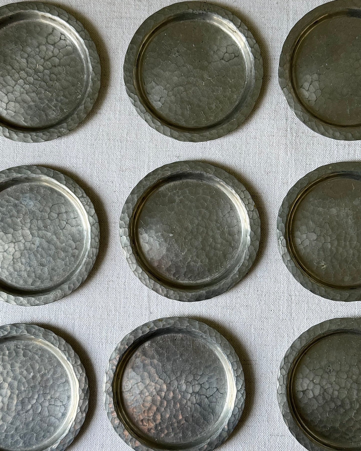 Set of 12 Scandinavian Hammered Pewter Coasters