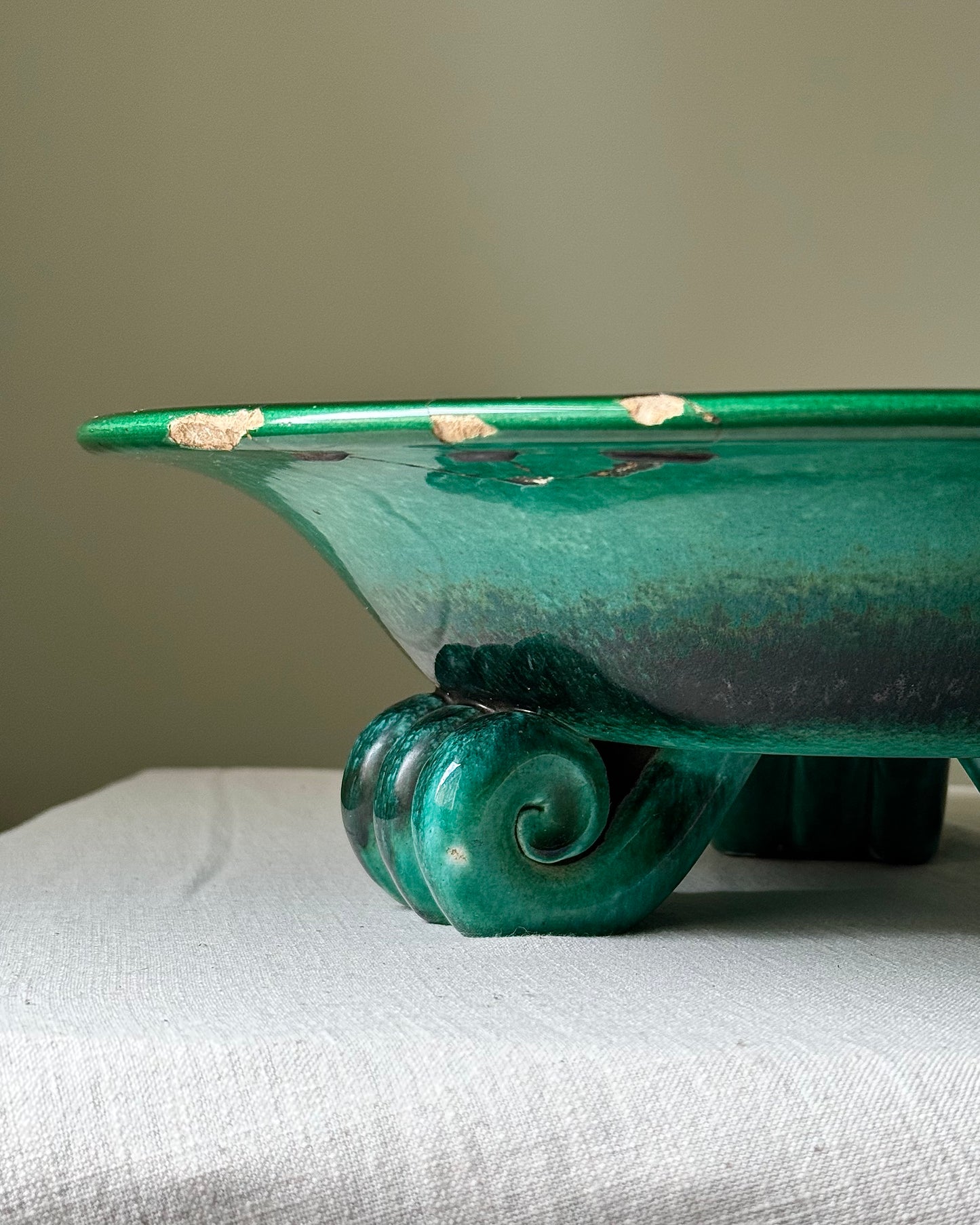 Early 20th Century Italian Green Glazed Ceramic Bowl with Scroll Feet