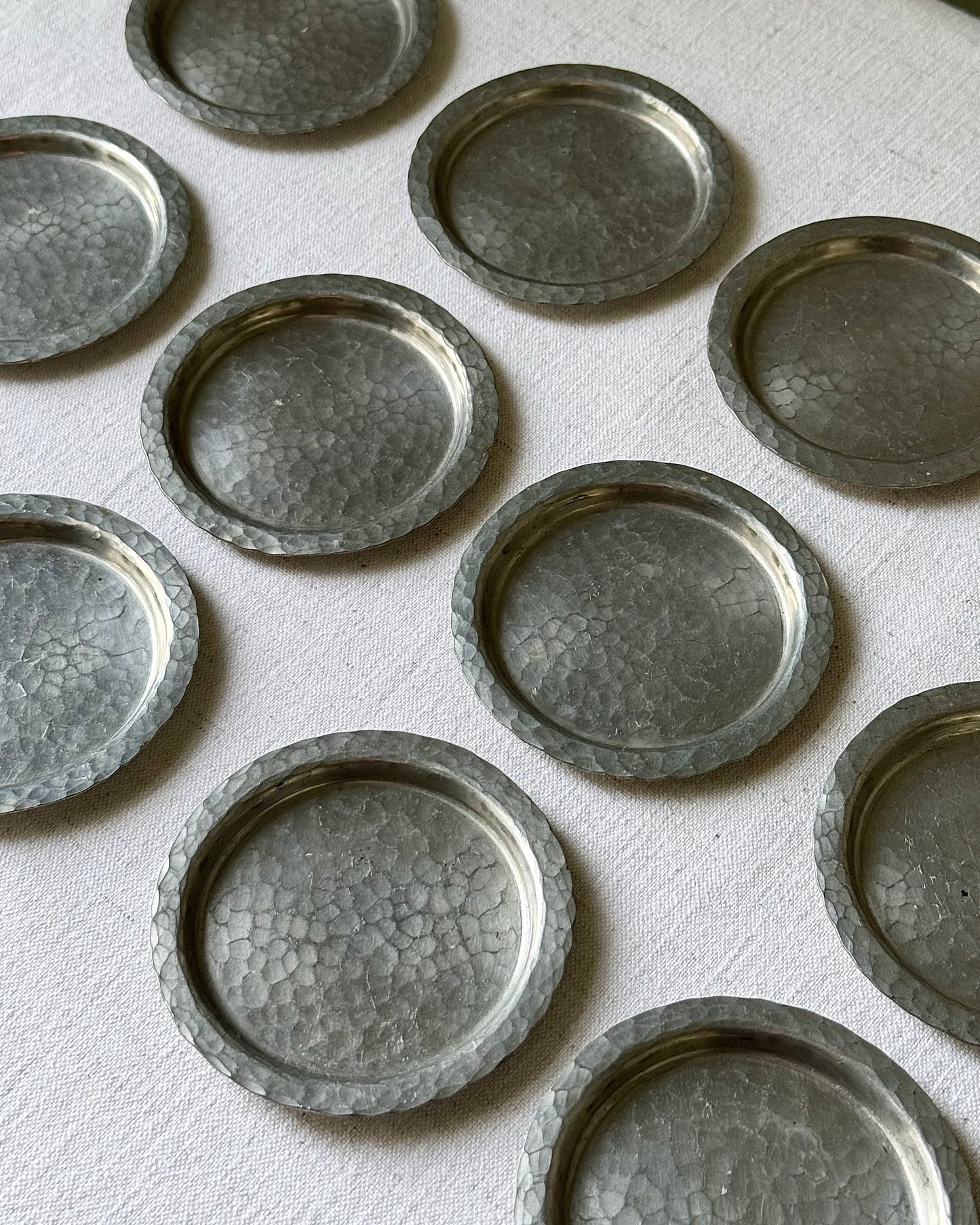 Set of 12 Scandinavian Hammered Pewter Coasters