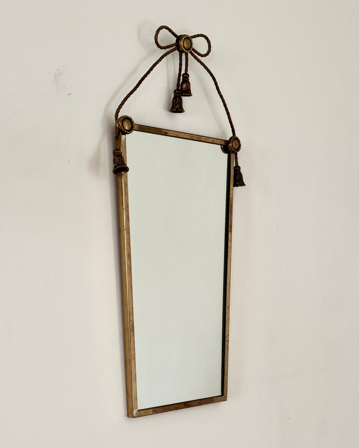 ON HOLD Brass Bow and Tassel Mirror