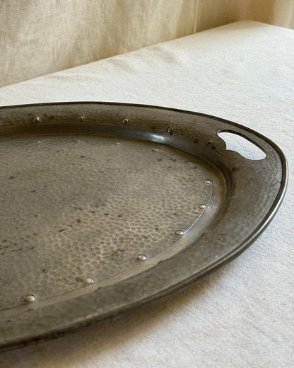 Detailed edge shot highlighting the polished handle cut-out of the pewter tray