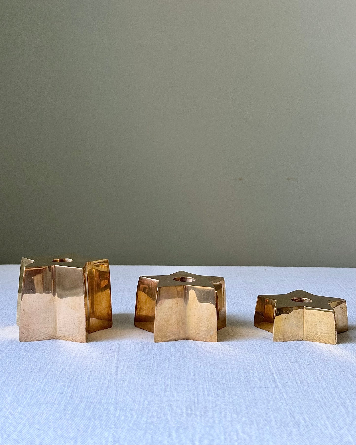 Trio of Scandinavian Graduated Brass Star Candleholders