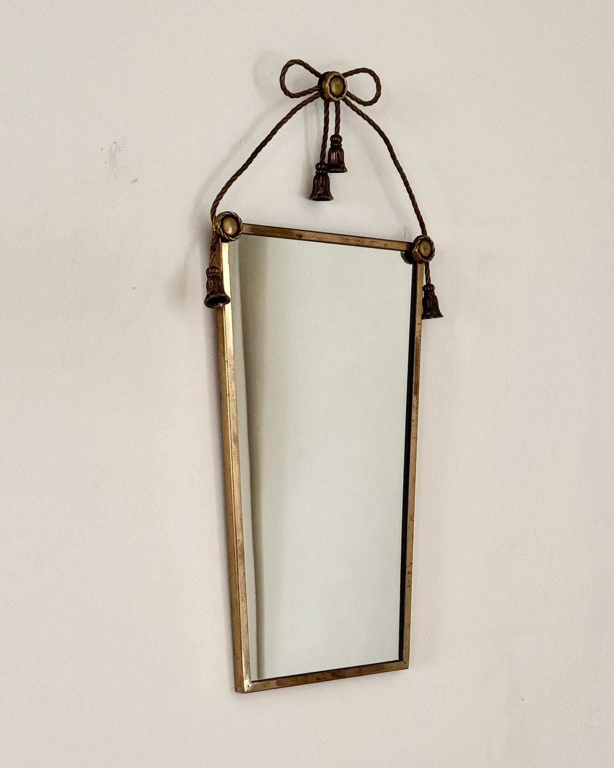 ON HOLD Brass Bow and Tassel Mirror