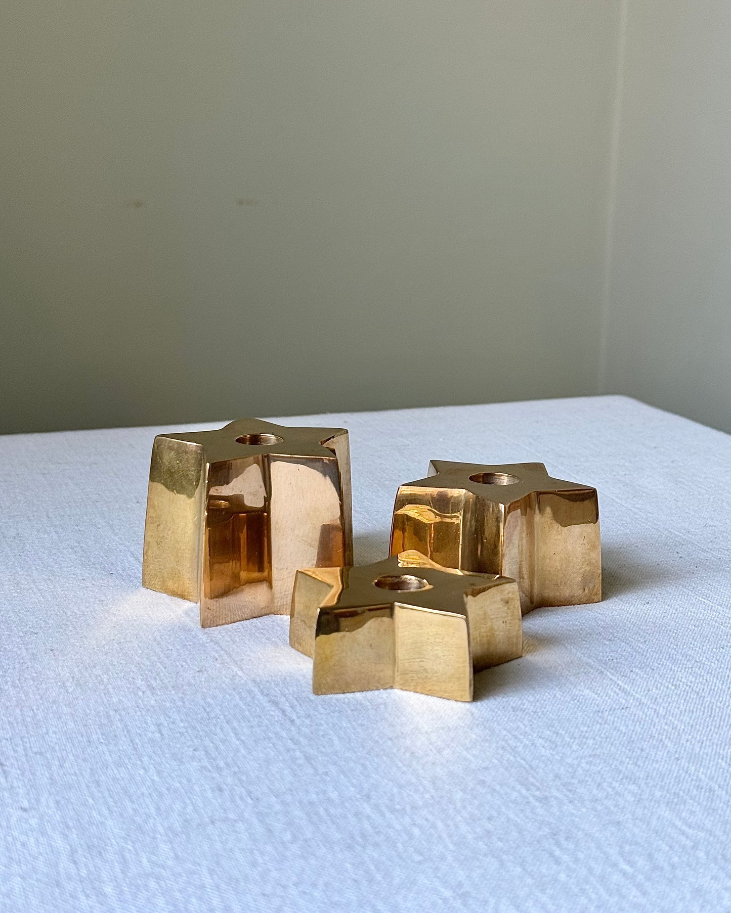 Trio of Scandinavian Graduated Brass Star Candleholders