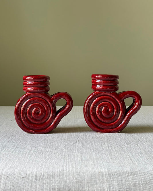 Pair of Vallauris Red Glaze Spiral Candlestick Holders