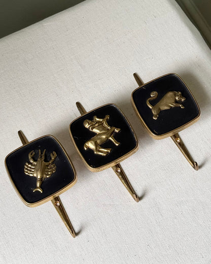 Brass Zodiac Hooks in the Style of Jacques Adnet, 1950’s