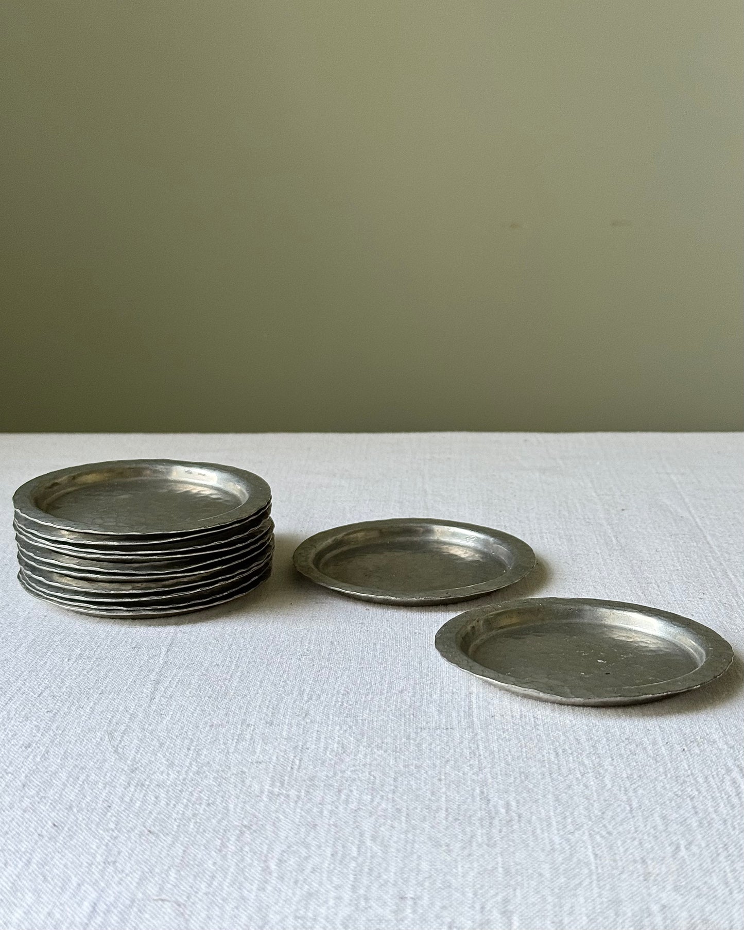 Set of 12 Scandinavian Hammered Pewter Coasters